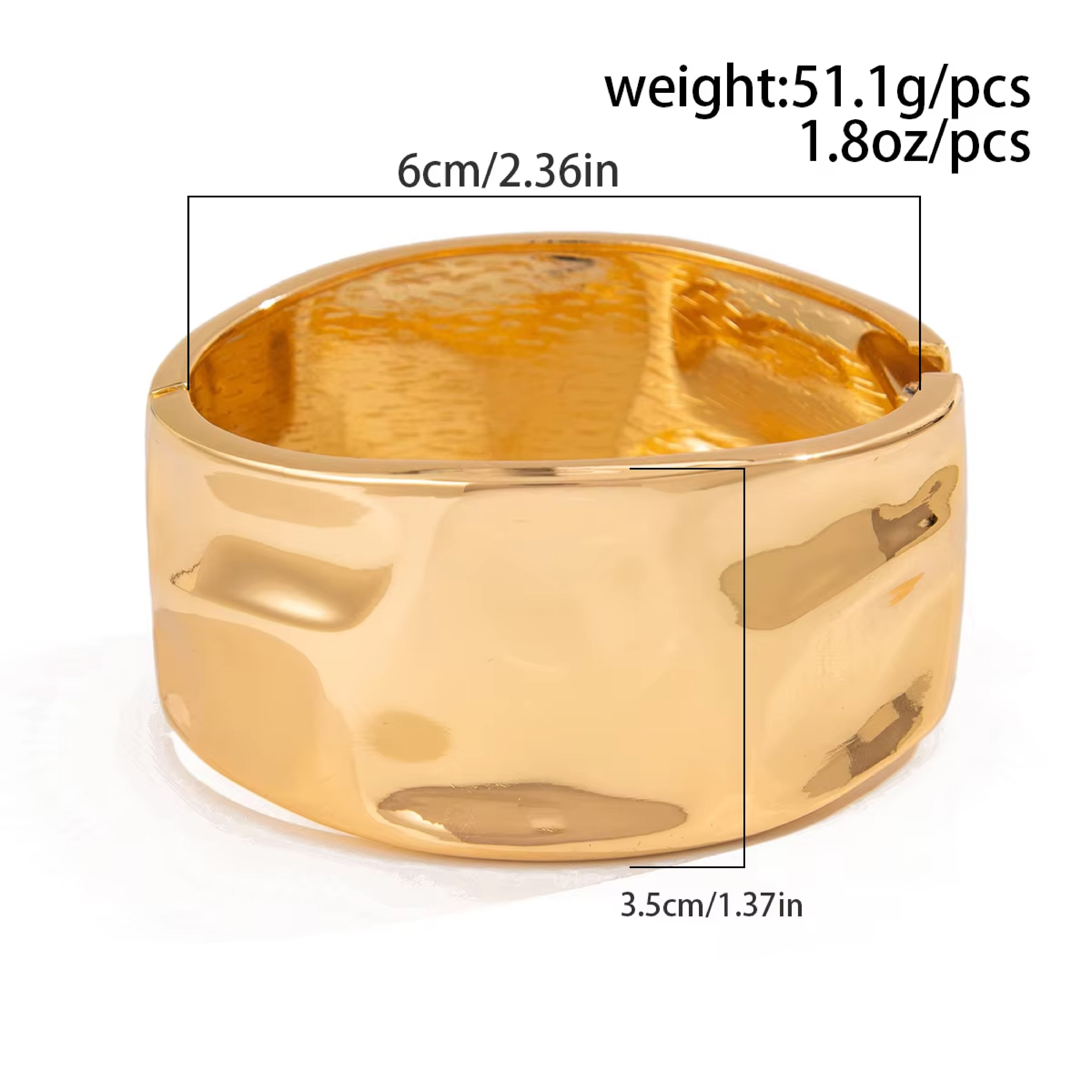 Wide gold cuff bracelet