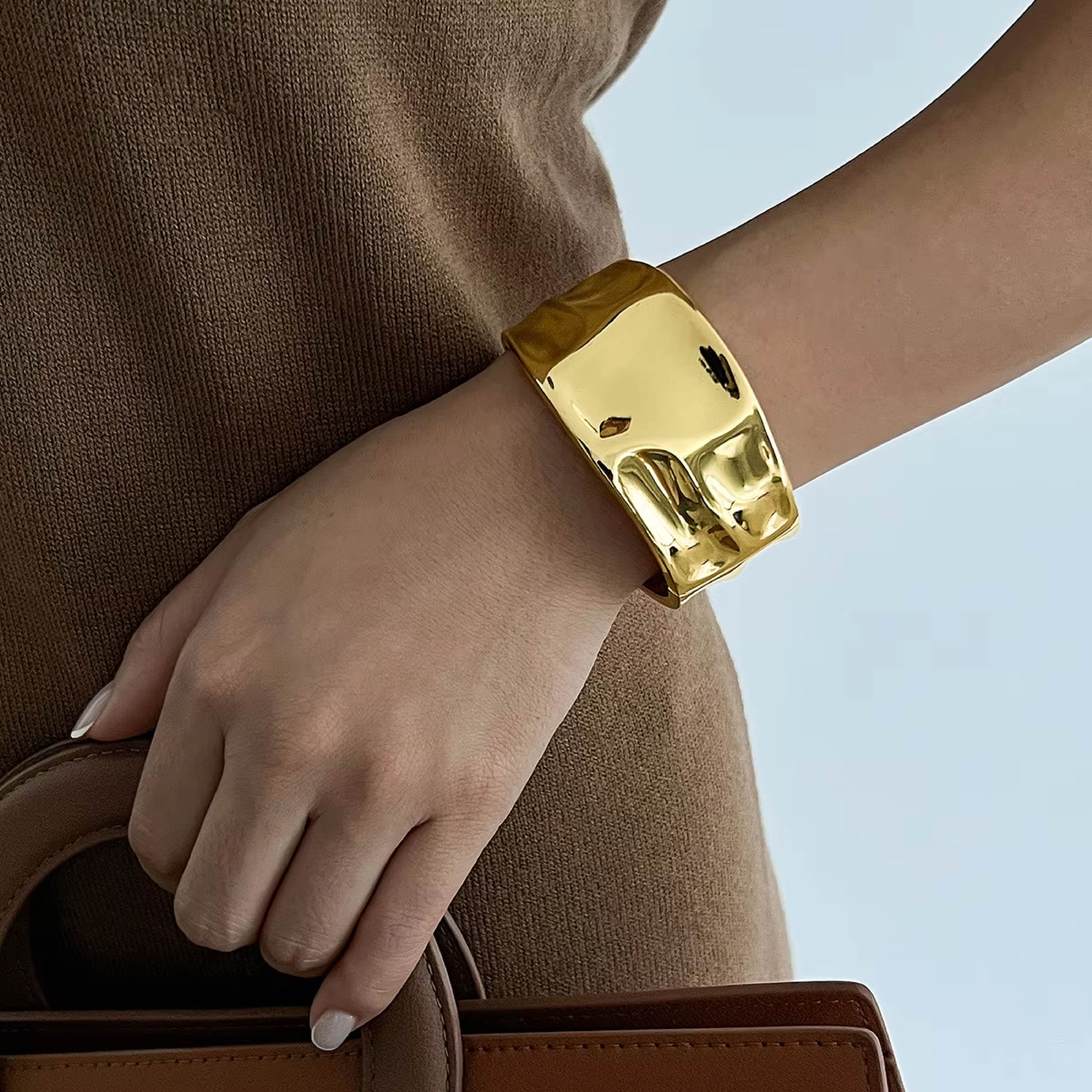 Wide gold cuff bracelet