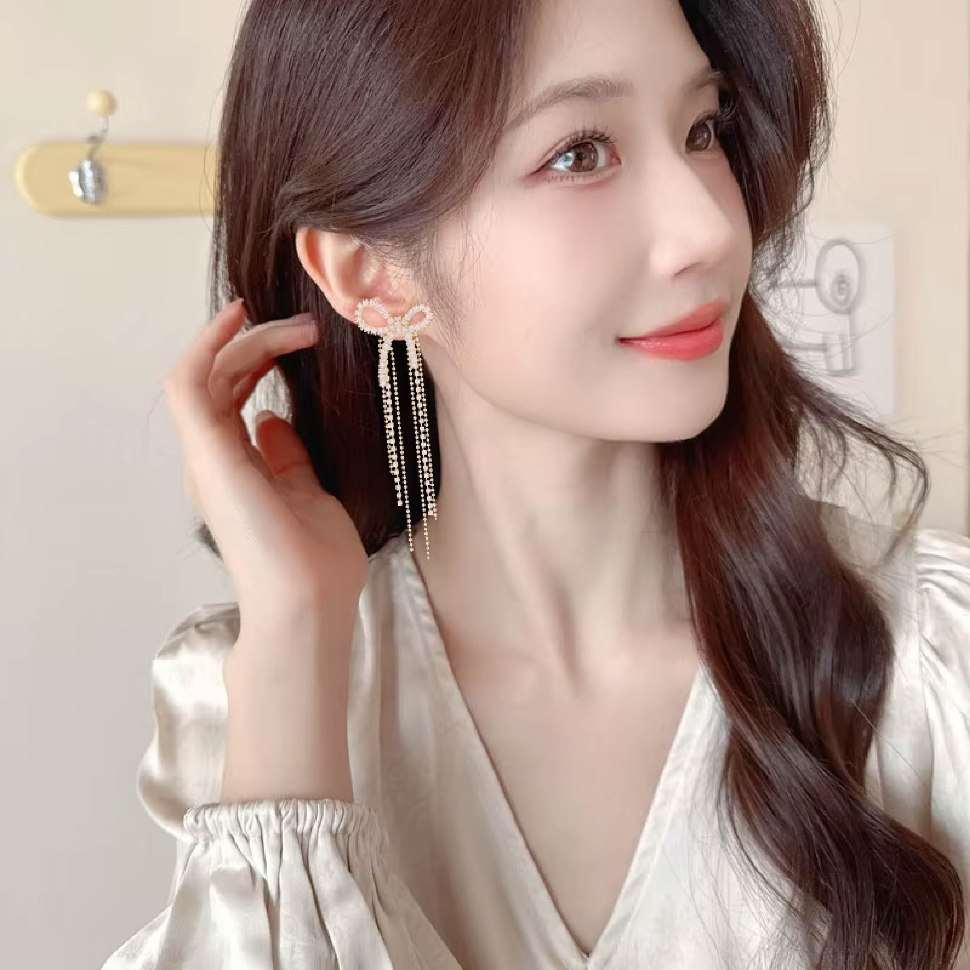 Silver Crystal Bow Tassel Earrings