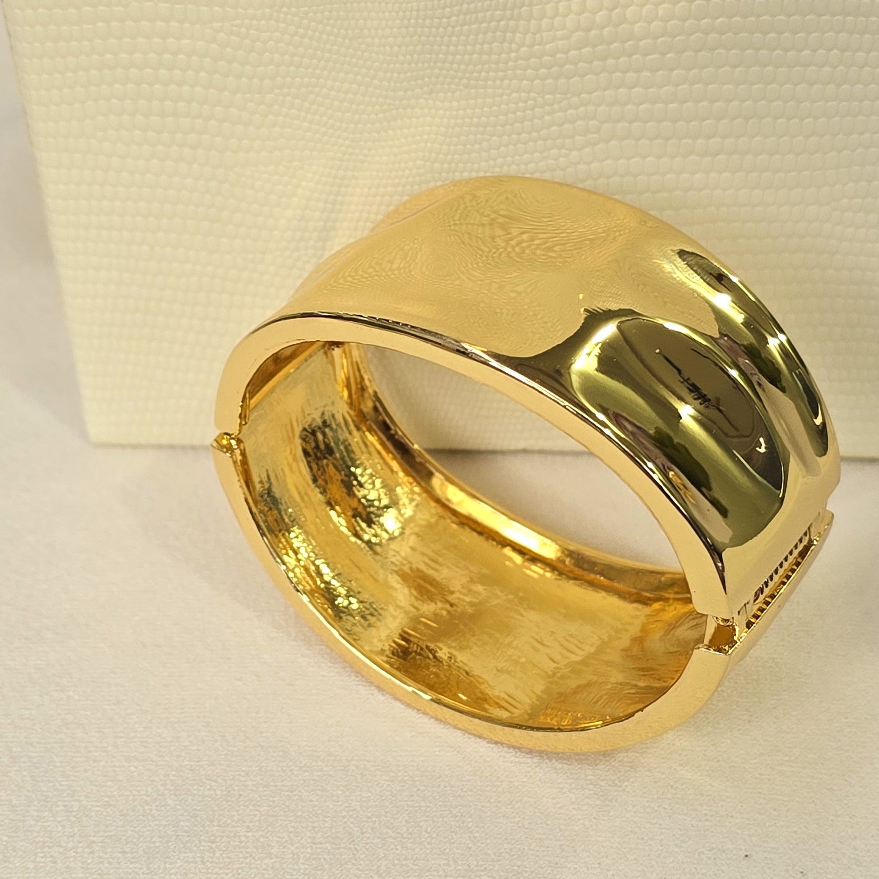 Wide gold cuff bracelet