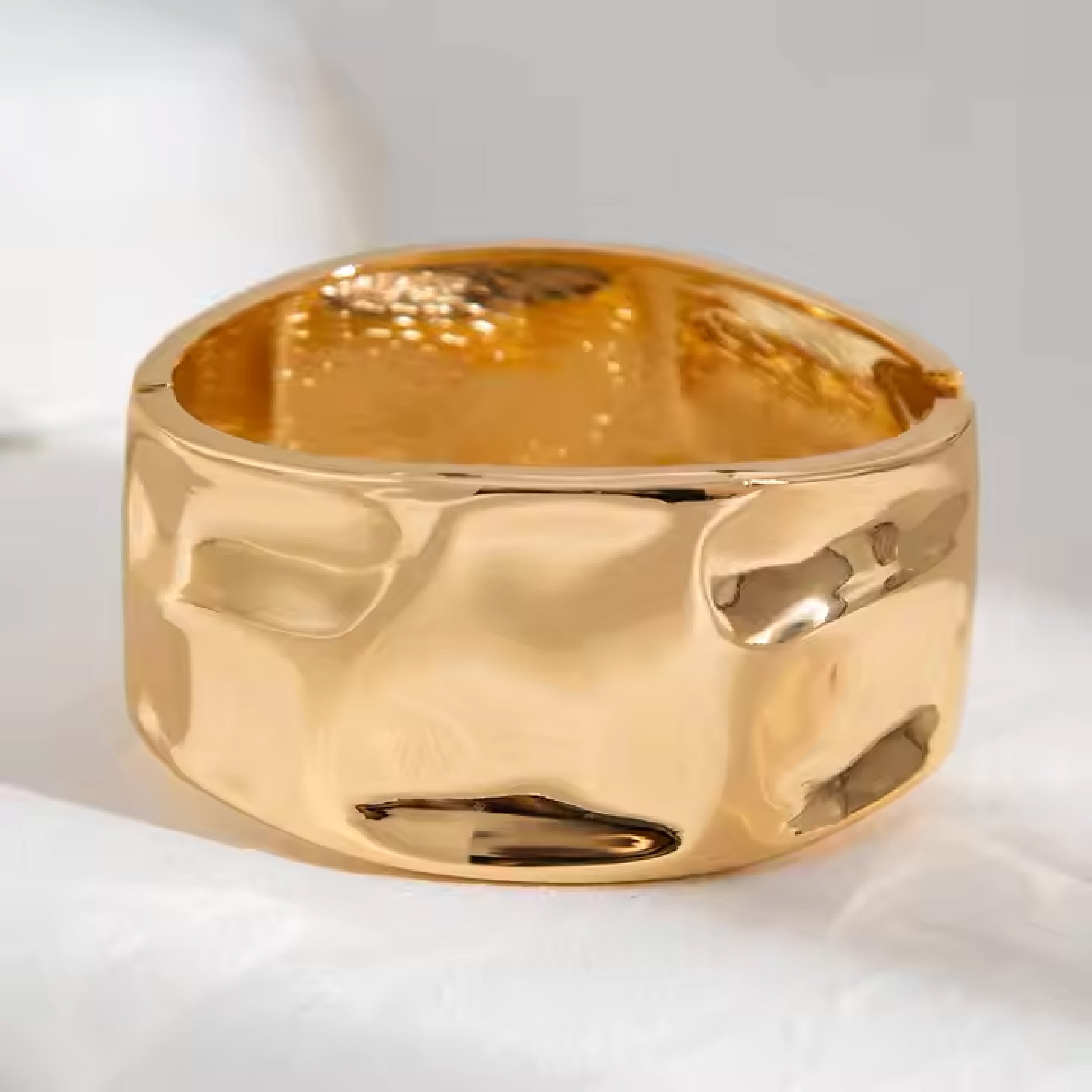 Wide gold cuff bracelet