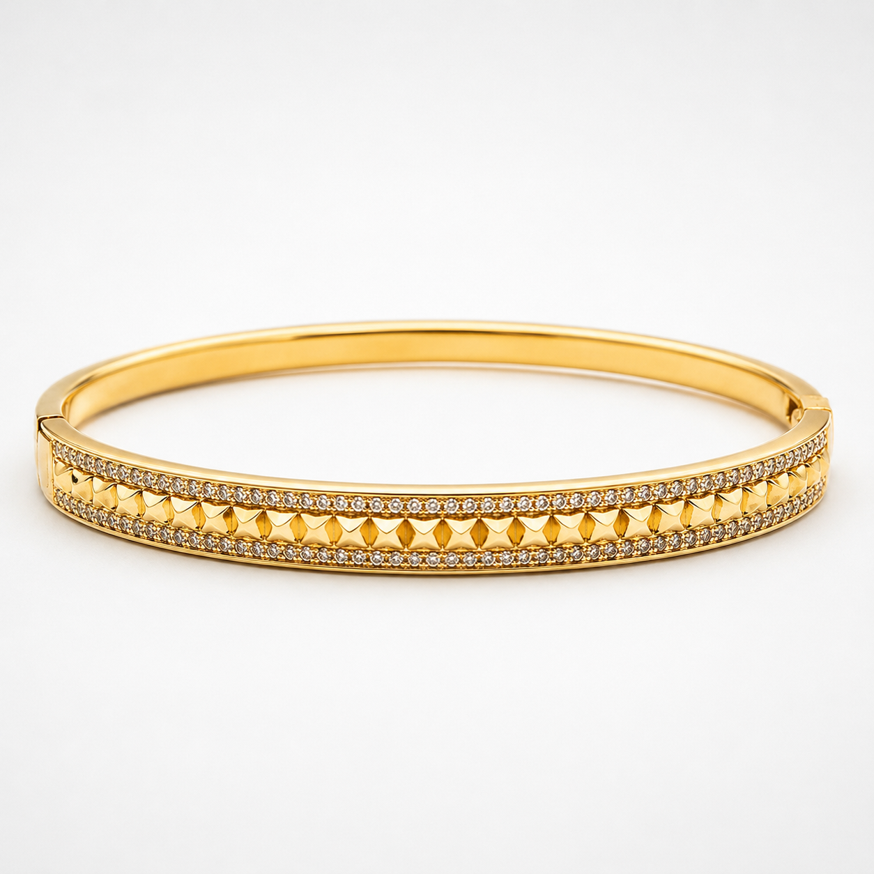 **Product Name:**
Radiant Gold Crystal Elegance Bracelet

**SEO Description:**
Add timeless charm to your jewelry collection with this elegant gold-tone bracelet featuring sparkling crystal detailing and a premium textured center design. Perfect for parties, weddings, festive occasions, and everyday styling. Lightweight, stylish, and crafted to complement both traditional and western outfits.

**SEO Keywords:**
gold bracelet, crystal bracelet, women's bracelet, fashion bracelet, gold-tone bracelet, elegant 